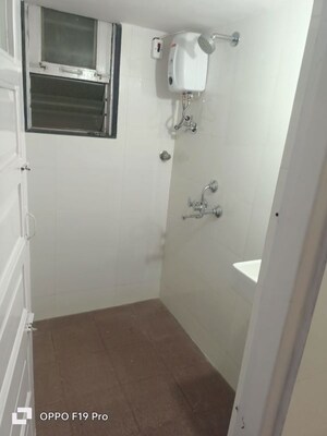 Bathroom in 1 BHK Apartment at Chanchal Smruti CHS, Wadala West – for Rent