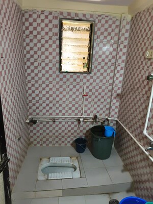 Bathroom in 2 BHK Apartment at Golden City Complex, Mira Road – for Rent