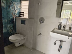Bathroom in 2 BHK Apartment at Vile Parle West – for Sale