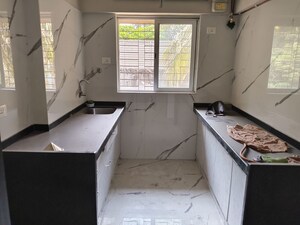Kitchen in 2 BHK Apartment at Vile Parle West – for Sale