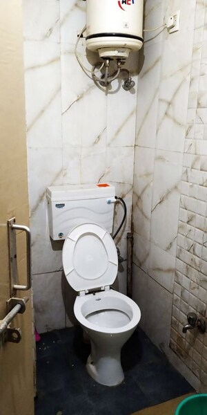 Bathroom in 1 RK Apartment at Ansal Sushant Estate, Sector 52 – for Rent