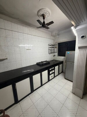 Kitchen in 1 BHK Apartment at Shatrughan Kutir CHS, Yashaswi Nagar – for Rent