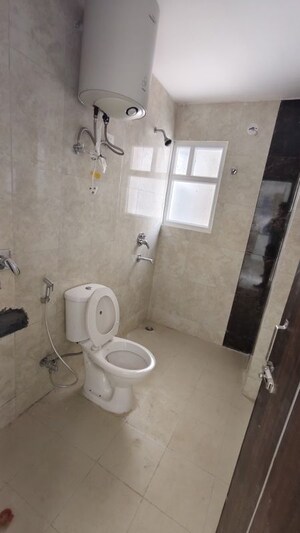 Bathroom in 2 BHK Apartment at Nirala Greenshire Phase I, Patwari – for Rent