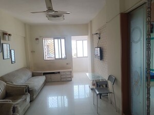 Living Room in 2 BHK Apartment at Al-Bahr CHS, Mahim – for Rent