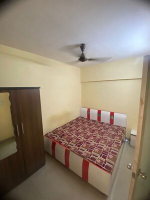 Bedroom in 2 BHK Apartment at IM Applaud 38, Goregaon East – for Rent