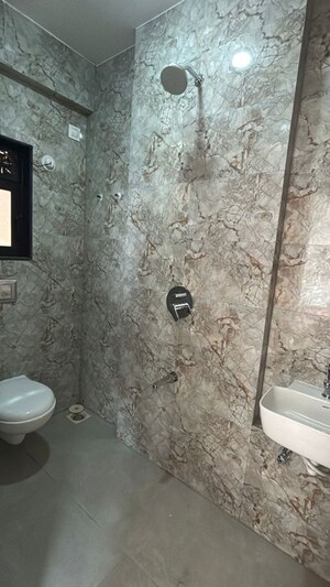 Bathroom in 1 BHK Apartment at Runwal Gardens, Dombivli East – for Rent