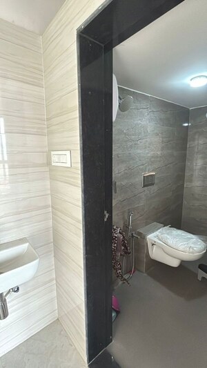 Bathroom in 1 BHK Apartment at Runwal Gardens, Dombivli East – for Rent