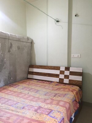 Bedroom in 2 BHK Apartment at Wadgaon Sheri – for Rent