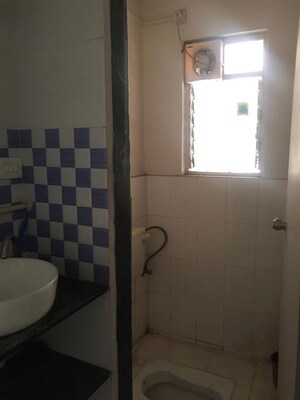 Bathroom in 2 BHK Apartment at Wadgaon Sheri – for Rent