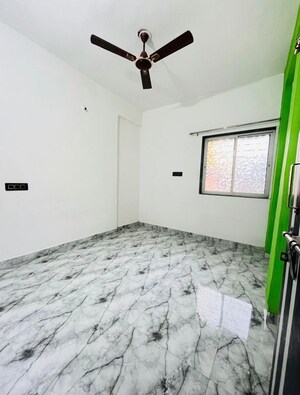 Bedroom in 1 BHK Apartment at Wadgaon Sheri – for Rent