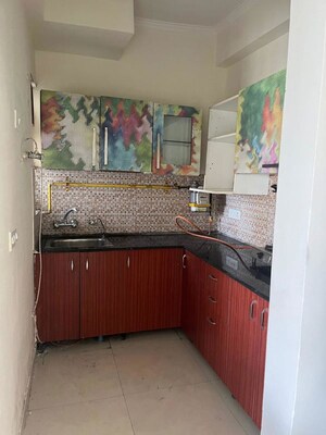 Kitchen in 3 BHK Apartment at Gaur Sportswood, Sector 79 – for Rent