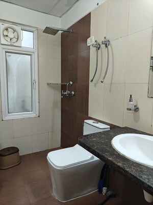 Bathroom in 2 BHK Apartment at Mahagun Moderne, Sector 78 – for Rent