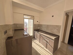 Kitchen in 2 BHK Apartment at Crescent Silverwoods, Powai – for Rent