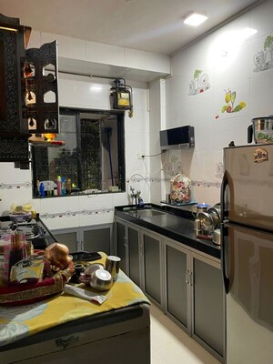 Kitchen in 1 BHK Apartment at Bhanushanti Complex, Malad East – for Sale