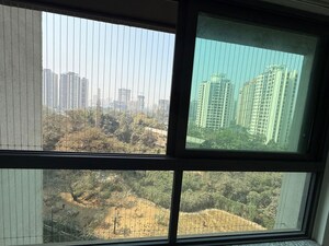 Room in 2 BHK Apartment at Kalpataru Immensa C, Kolshet Road – for Rent