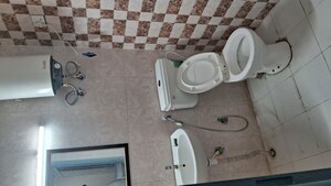 Bathroom in 2 BHK Apartment at Pivotal Riddhi Siddhi, Sector 99 – for Rent