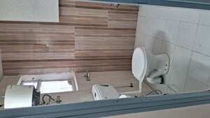 Bathroom in 2 BHK Apartment at Pivotal Riddhi Siddhi, Sector 99 – for Rent