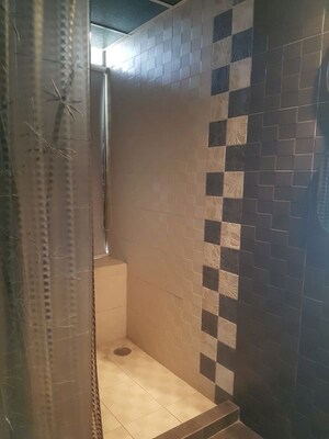 Bathroom in 4 BHK Apartment at Oberoi Crest, Khar West – for Rent