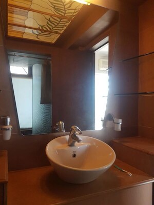 Bathroom in 4 BHK Apartment at Oberoi Crest, Khar West – for Rent