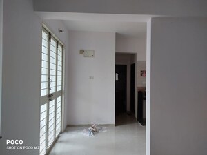 Room in 1 BHK Apartment at Shri Vardhaman Vatika, Thergaon – for Sale