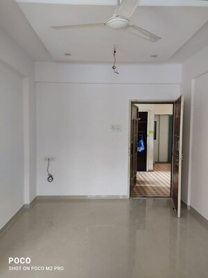 Building Lobby in 1 BHK Apartment at Shri Vardhaman Vatika, Thergaon – for Sale