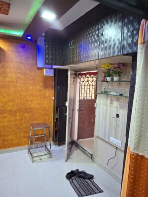 Living Room in 1 BHK Apartment at Nagari Niwara CHS, Goregaon East – for Rent