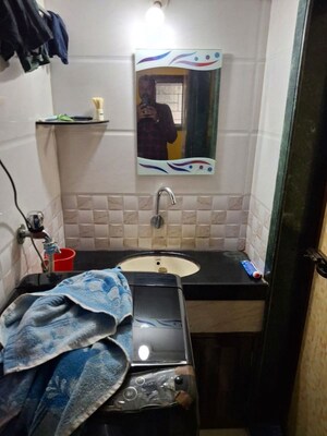 Master Bedroom in 1 BHK Apartment at Nagari Niwara CHS, Goregaon East – for Rent