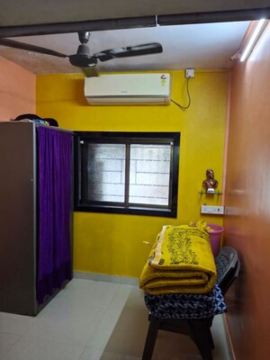 Bedroom in 1 BHK Apartment at Nagari Niwara CHS, Goregaon East – for Rent