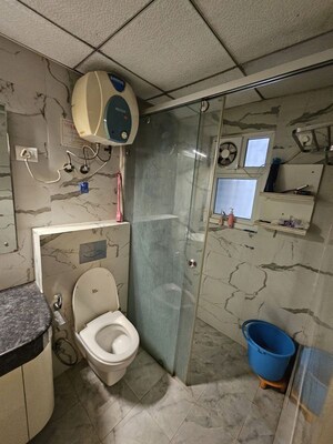 Bathroom in 3.5 BHK Apartment at Purvanchal Kings Court, Gomti Nagar – for Rent