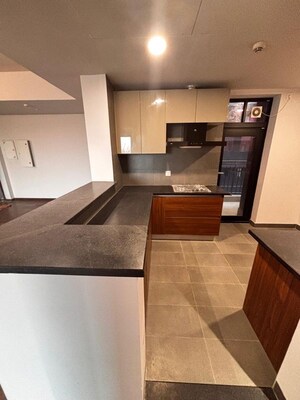 Kitchen in 2.5 BHK Apartment at Krisumi Waterfall Residences, Sector 36a – for Sale