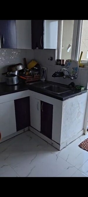 Kitchen in 3 BHK Apartment at Casa Woodstock, Sector 16c Greater Noida – for Sale