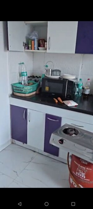 Kitchen in 3 BHK Apartment at Casa Woodstock, Sector 16c Greater Noida – for Sale