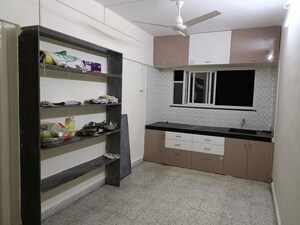 Kitchen in 2 BHK Apartment at Mahalaxmi Nagar CHS, Warje – for Rent