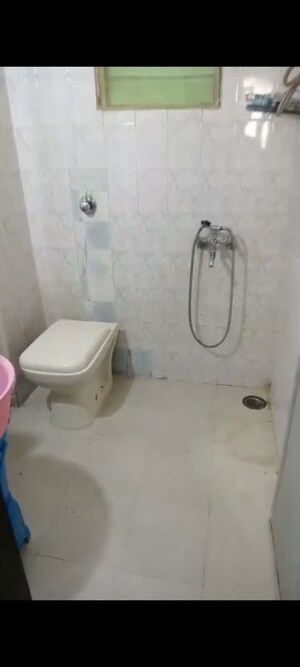 Bathroom in 2 BHK Apartment at Rutu Enclave, Kasarvadavali – for Rent