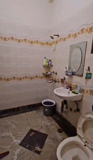 Bathroom in 2 BHK Apartment at Bhasin Apartments, Niti Khand I – for Rent