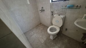 Bathroom in 1 BHK Apartment at Kolte Patil Margosa Heights, Mohammadwadi – for Rent