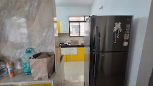 Kitchen in 1 BHK Apartment at Kolte Patil Margosa Heights, Mohammadwadi – for Rent