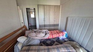 Bedroom in 1 BHK Apartment at Kolte Patil Margosa Heights, Mohammadwadi – for Rent