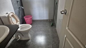 Bathroom in 1 BHK Apartment at Kolte Patil Margosa Heights, Mohammadwadi – for Rent