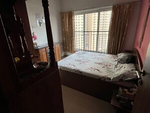 Bedroom in 2 BHK Apartment at Rustomjee Urbania Acura, Thane West – for Rent