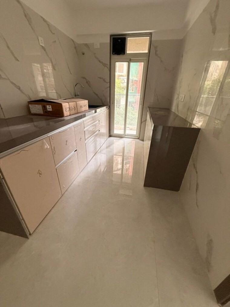 Kitchen, sweet-home 2 Bedroom 1000 Sq.Ft. Apartment In Juhu Mumbai 9291385