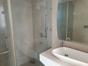 Bathroom in 4 BHK Apartment at Mahagun Mezzaria, Sector 78 – for Rent