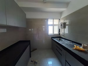 Kitchen in 2 BHK Apartment at Vaibhav Queens Park, Chembur – for Rent