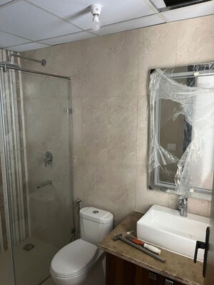 Bathroom in 3 BHK Apartment at Central Park Flower Valley Aqua Front Towers, Sohna Sector 33 – for Rent