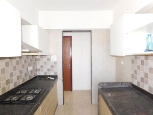 Kitchen in 2 BHK Apartment at LK Umang Heights, Andheri West – for Rent