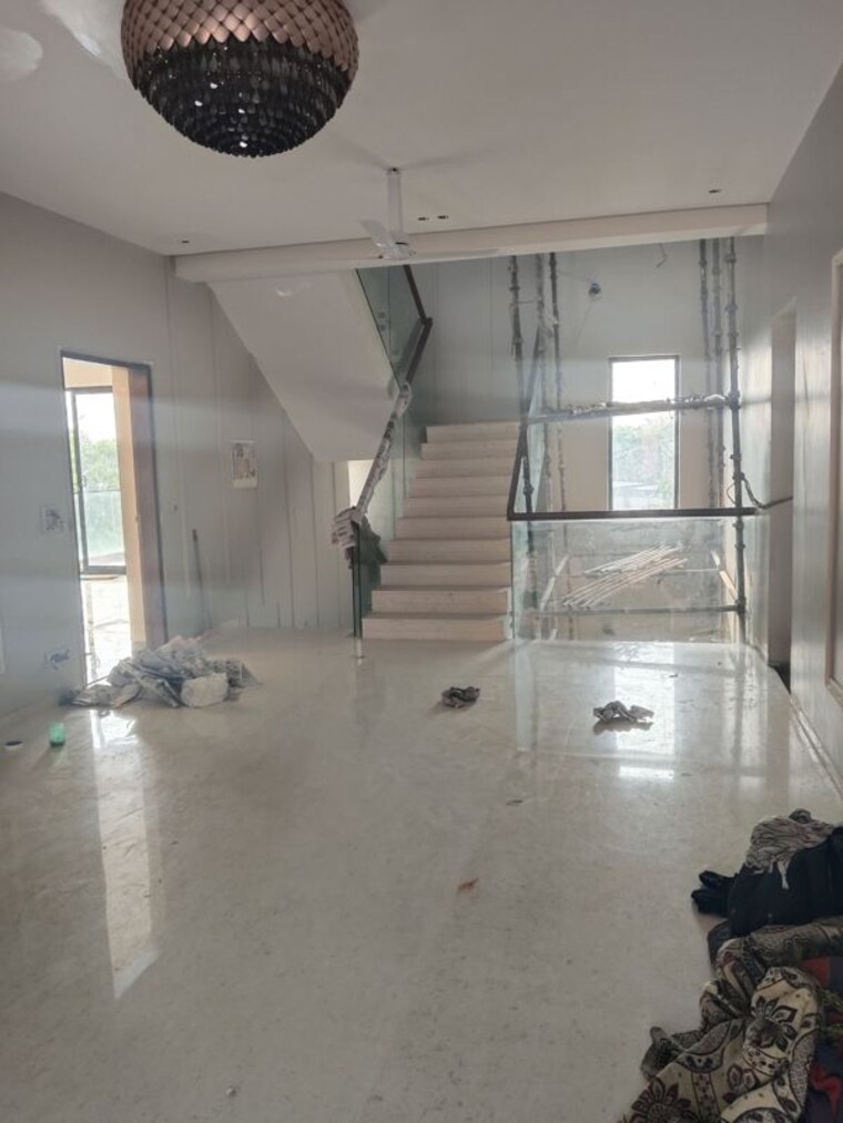 Living Room, unitech-uniworld-resorts-the-residences 4 Bedroom 502 Sq.Yd. Villa In Sector 33 Gurgaon 10214123