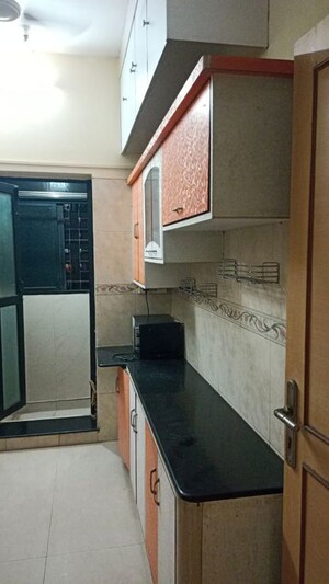 Kitchen in 1 BHK Apartment at K Raheja Heights, Malad East – for Rent