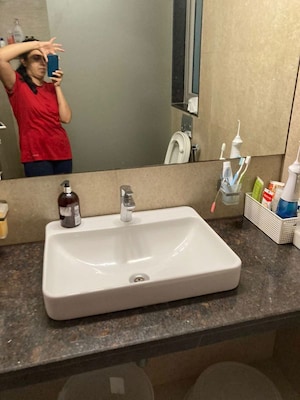 Bathroom in 2 BHK Apartment at Adani Western Heights Sky Apartments, Andheri West – for Rent