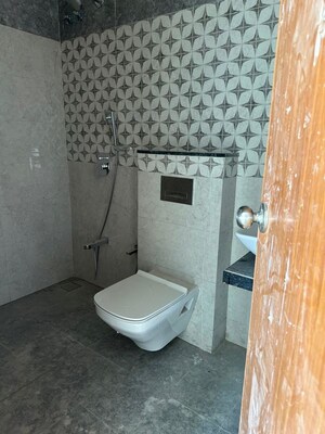 Bathroom in 3 BHK Apartment at Naman Habitat, Andheri West – for Rent