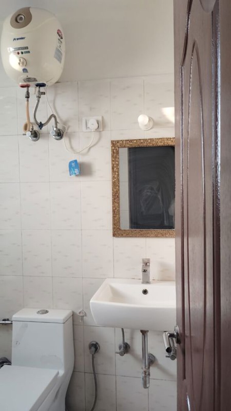 Bathroom, shree-vardhman-mantra 2 Bedroom 600 Sq.Ft. Apartment In Sector 67 Gurgaon 10214198